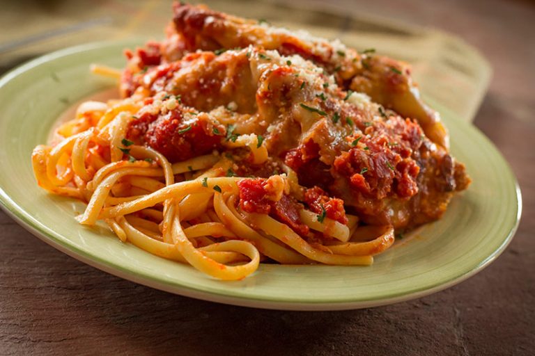 Chicken parmesan over pasta