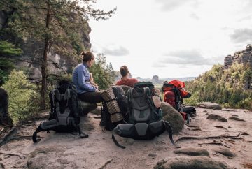 Picture of a family on top of a mountain