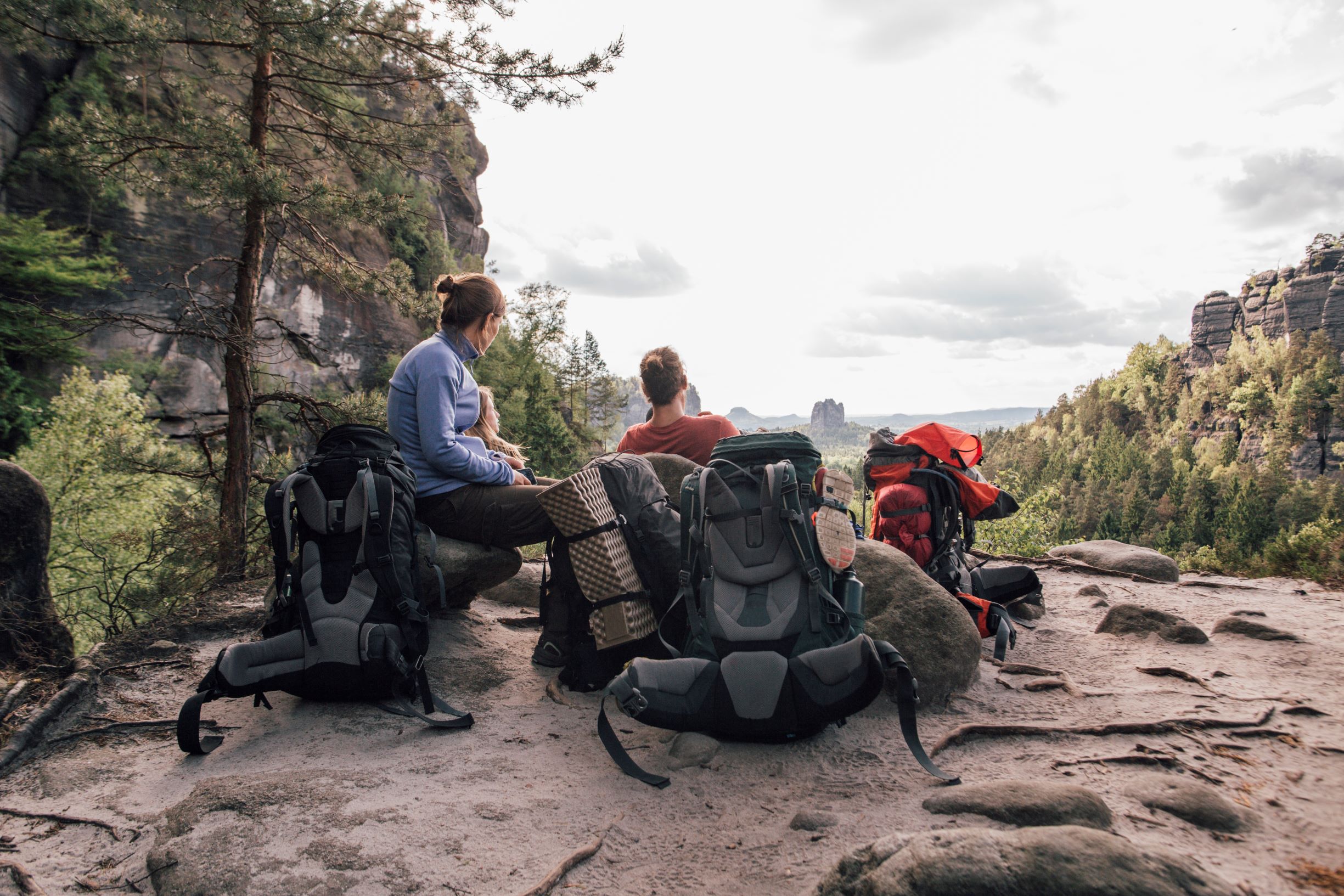 Picture of a family on top of a mountain