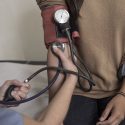 Picture of a woman getting her blood pressure taken