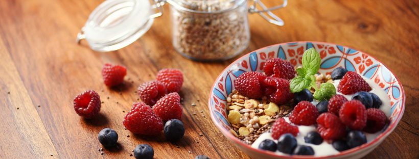 Picture of a bowl of yogurt with granola and fruit