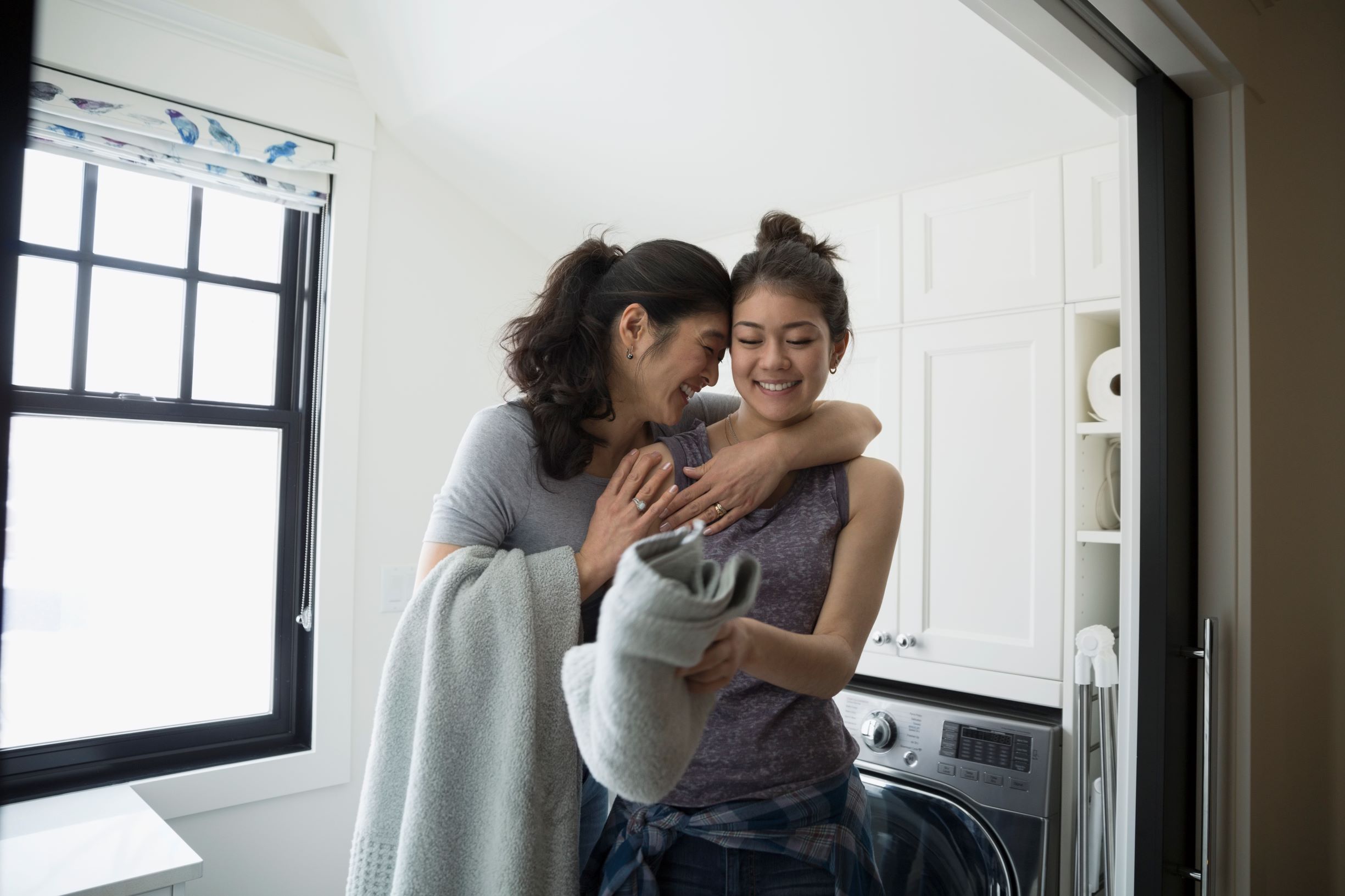 Picture of mom hugging a daughter