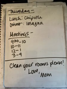 Picture of a whiteboard with family schedule