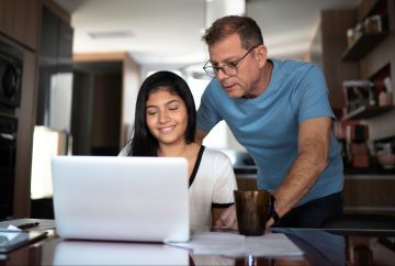 Picture of a dad helping child with homework