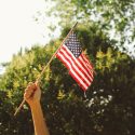 Picture of someone holding an American flag