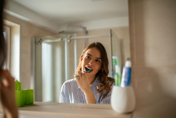 Girl brushing her teeth