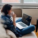 Woman sitting at laptop