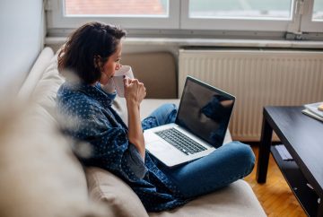 Woman sitting at laptop