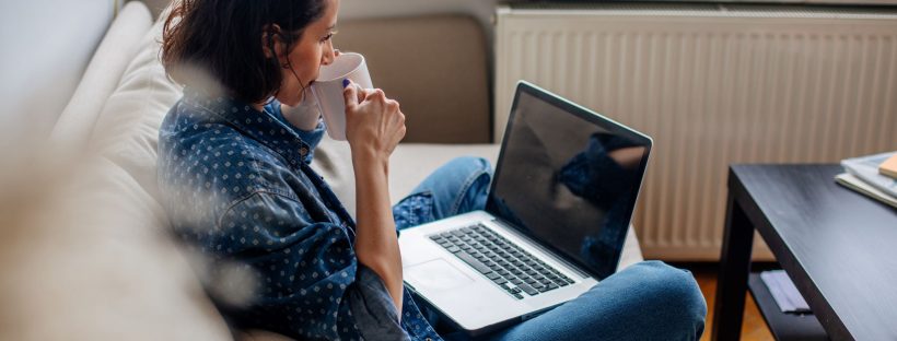 Woman sitting at laptop