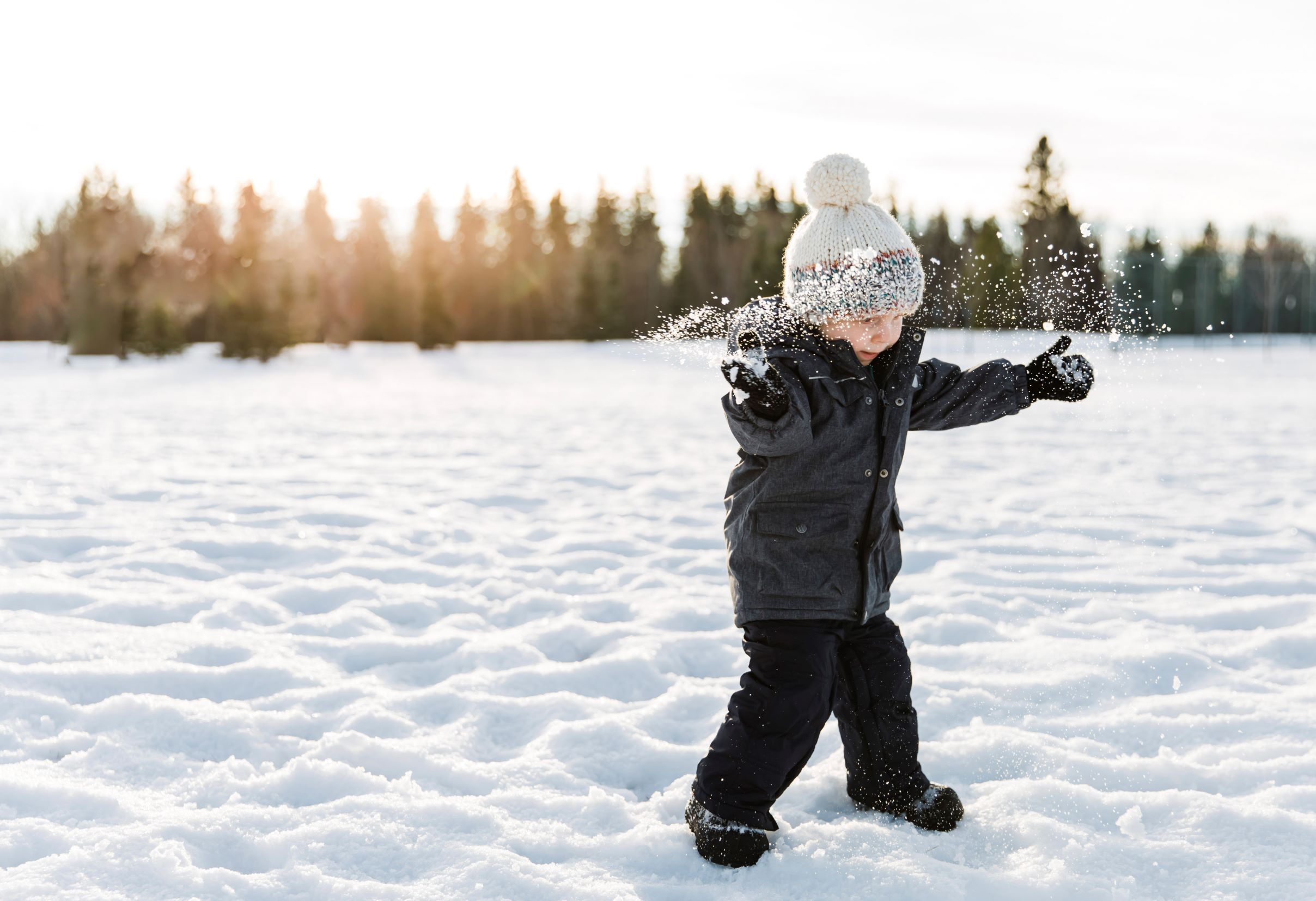 boy playing in snow